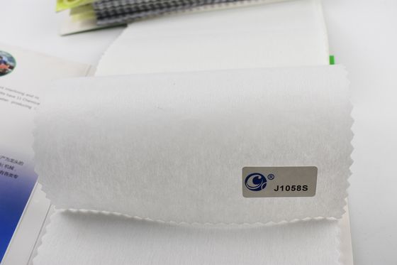Tecido não tecido de 100% poliéster de bordados suaves para vestuário com interface de fusão
