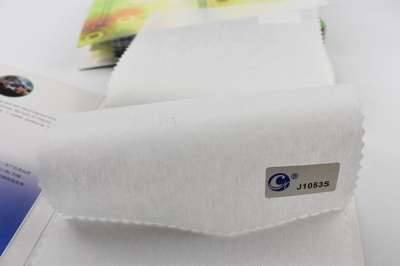 Tecido não tecido de 100% poliéster de bordados suaves para vestuário com interface de fusão